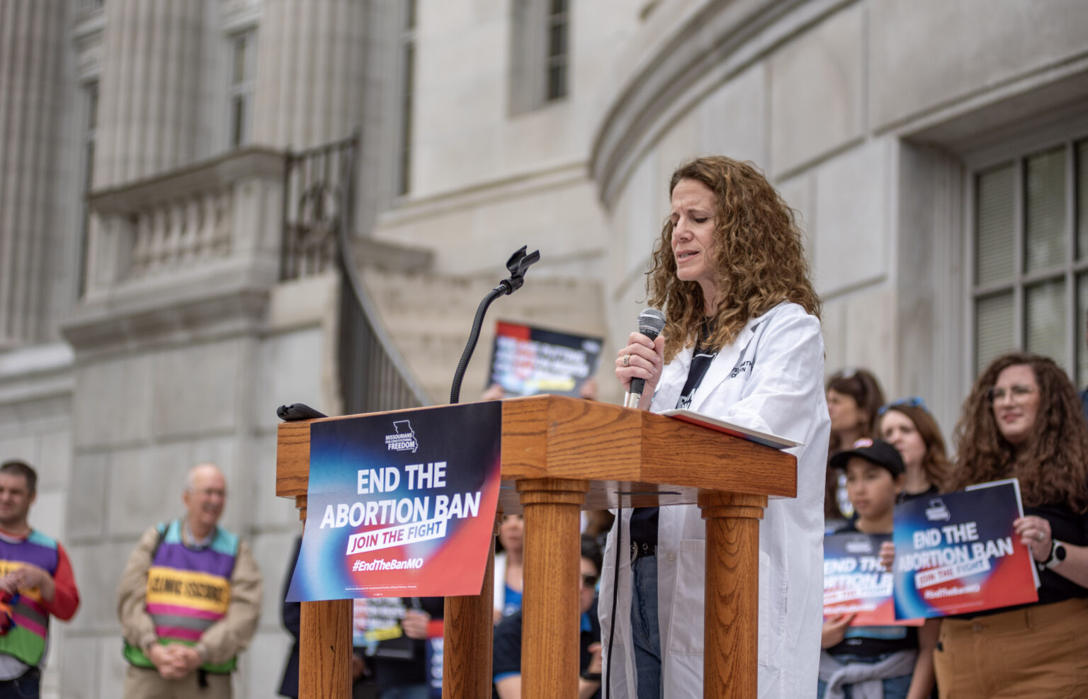 woman speaking at abortion event