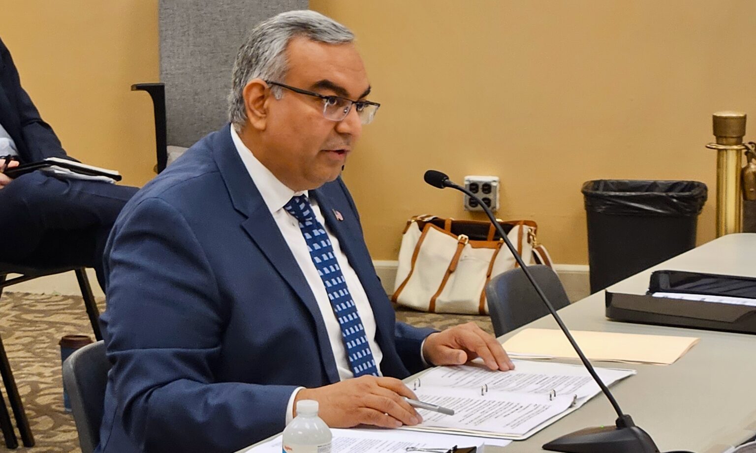 vivek malek at a hearing