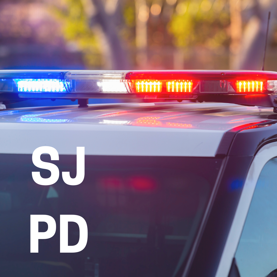 Police lights in background with "SJPD" 
